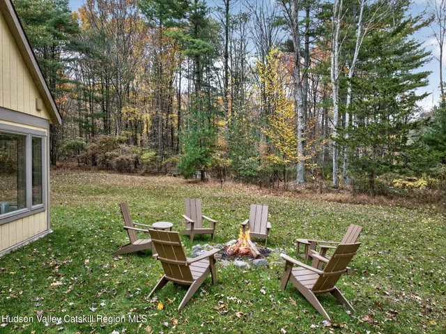 a view of a pathway both side of yard