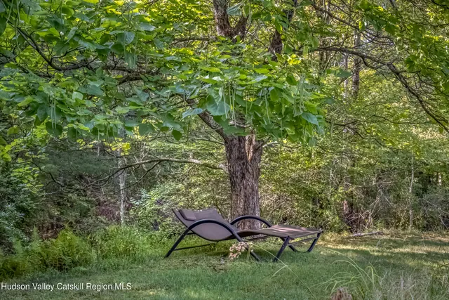 a bathroom with a toilet a sink and bathtub