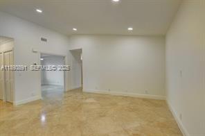 9801 Ridge Creek Road Boca Raton, FL 33496 - Photo 18 of 54 a view of a room with an empty space