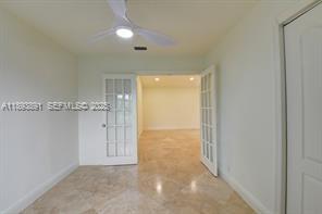 9801 Ridge Creek Road Boca Raton, FL 33496 - Photo 19 of 54 a view of an empty room