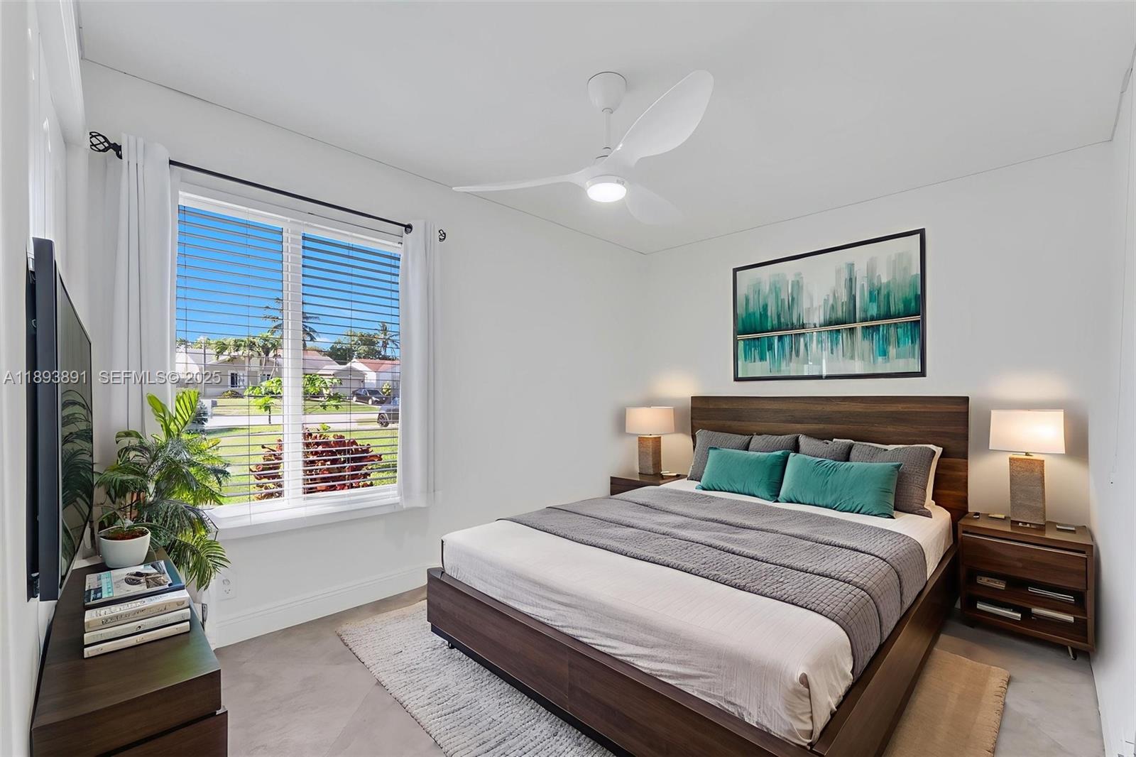 9801 Ridge Creek Road Boca Raton, FL 33496 - Photo 22 of 54 a bedroom with a large bed and a window