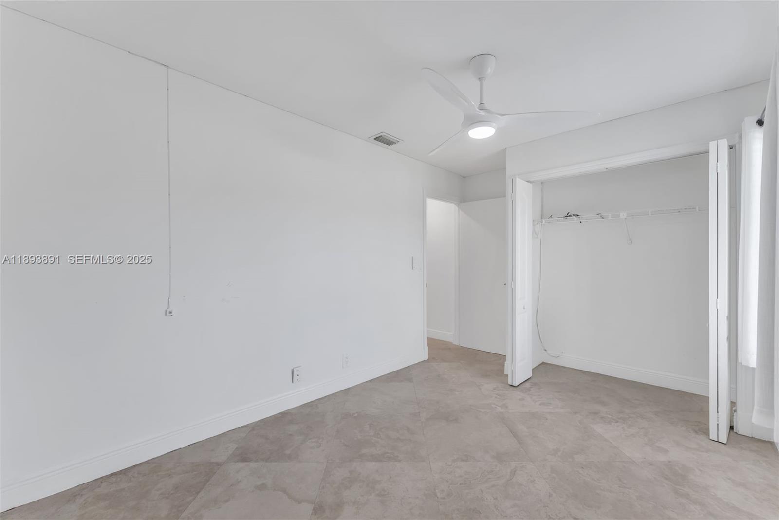 9801 Ridge Creek Road Boca Raton, FL 33496 - Photo 28 of 54 a view of an empty room