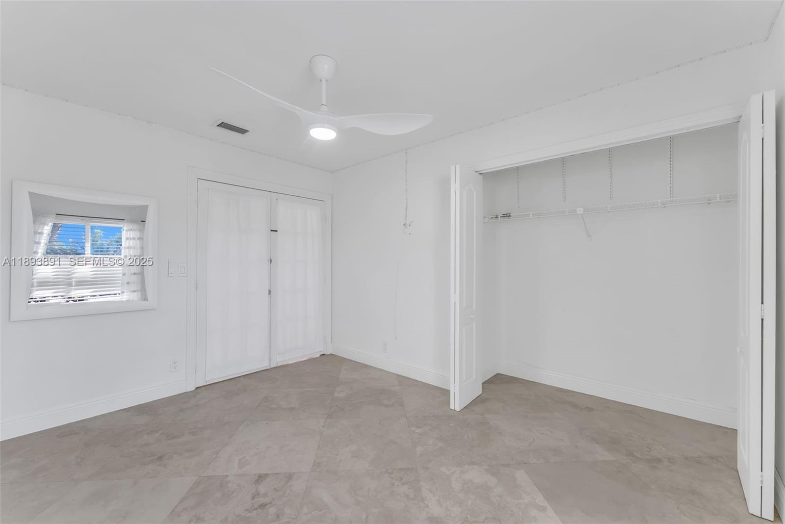 9801 Ridge Creek Road Boca Raton, FL 33496 - Photo 30 of 54 a view of an empty room