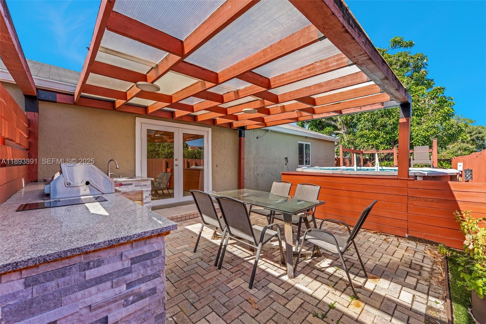 9801 Ridge Creek Road Boca Raton, FL 33496 - Photo 40 of 54 a outdoor space with sitting space