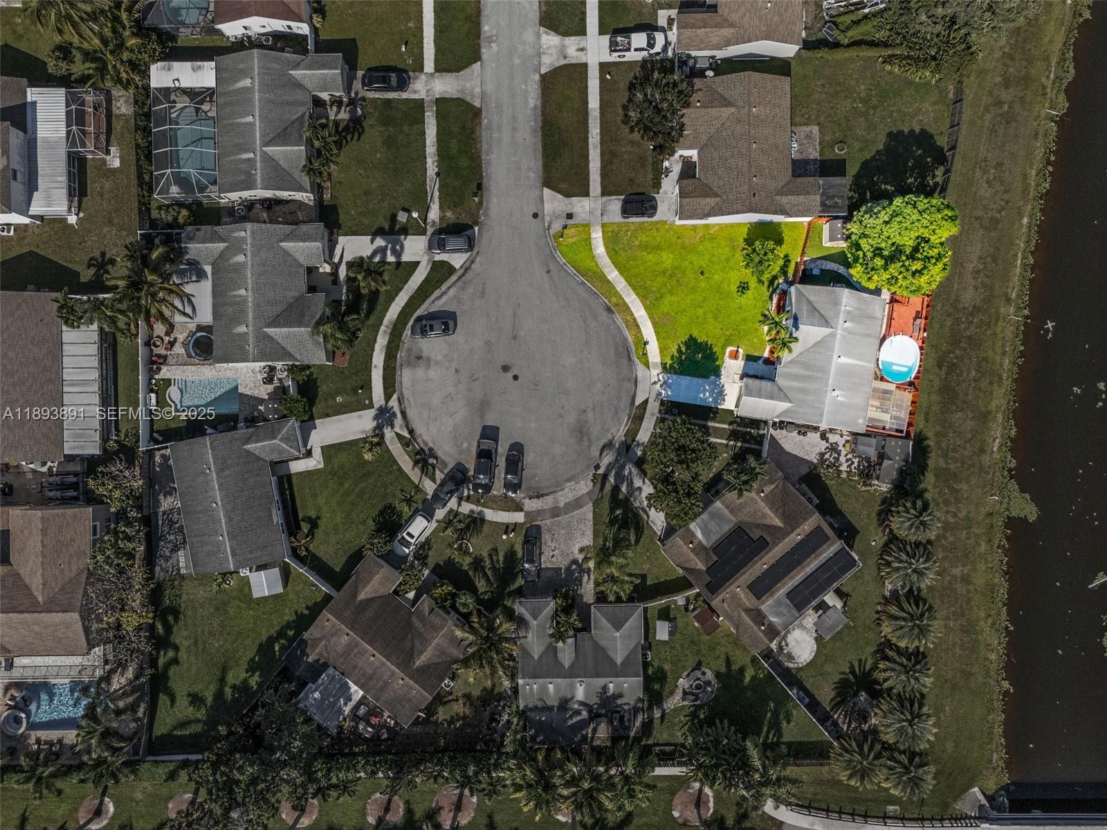 9801 Ridge Creek Road Boca Raton, FL 33496 - Photo 50 of 54 an aerial view of a house with outdoor space