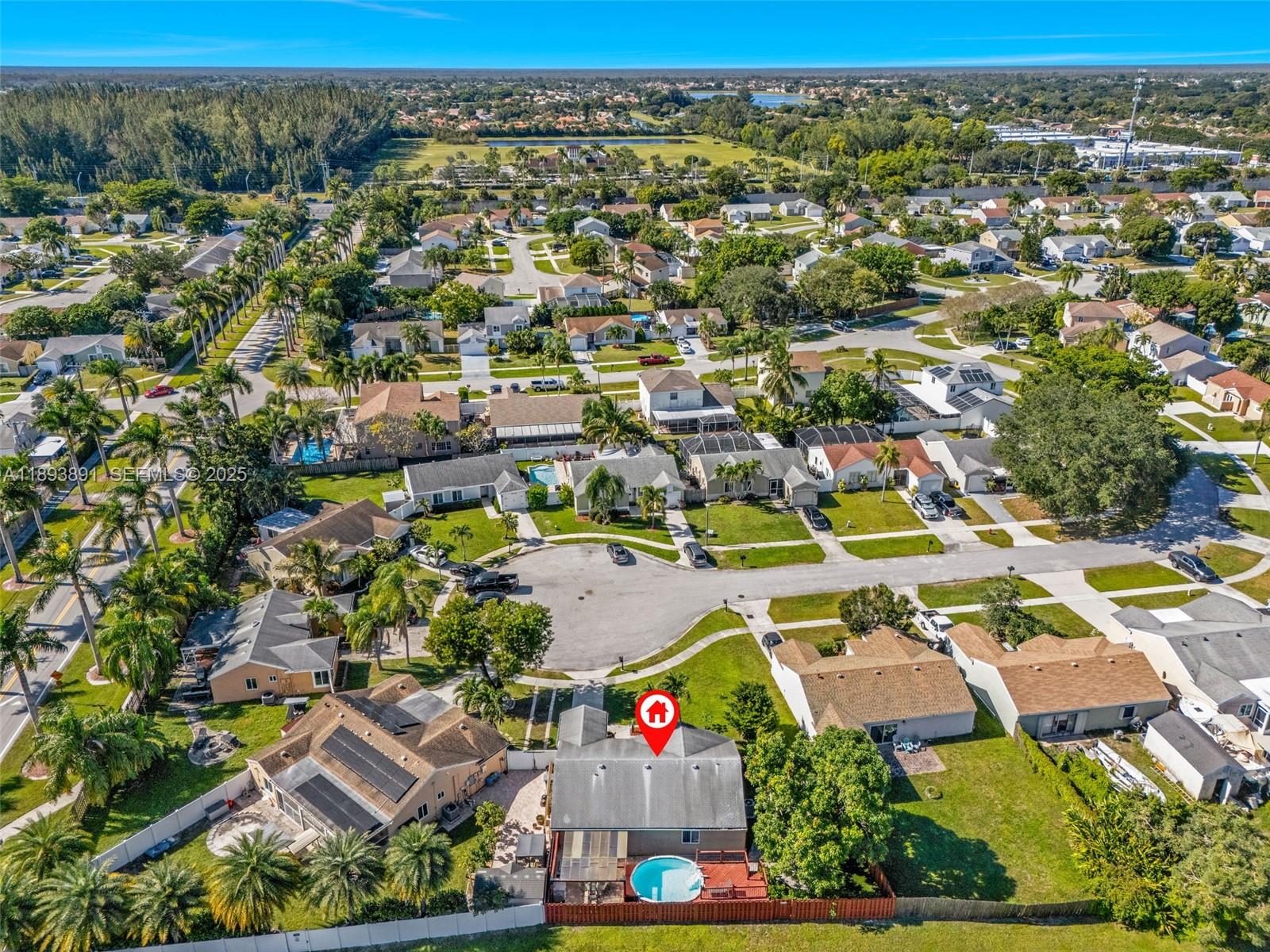9801 Ridge Creek Road Boca Raton, FL 33496 - Photo 5 of 54 an aerial view of residential houses with outdoor space and street view