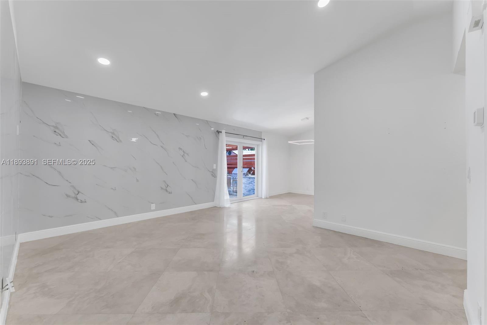 9801 Ridge Creek Road Boca Raton, FL 33496 - Photo 7 of 54 a view of an empty room