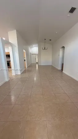 a view of a kitchen with a sink