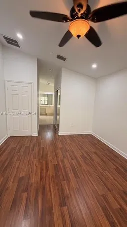 a view of living room with furniture and window