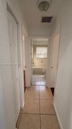 a bathroom with a sink a toilet and a bathtub