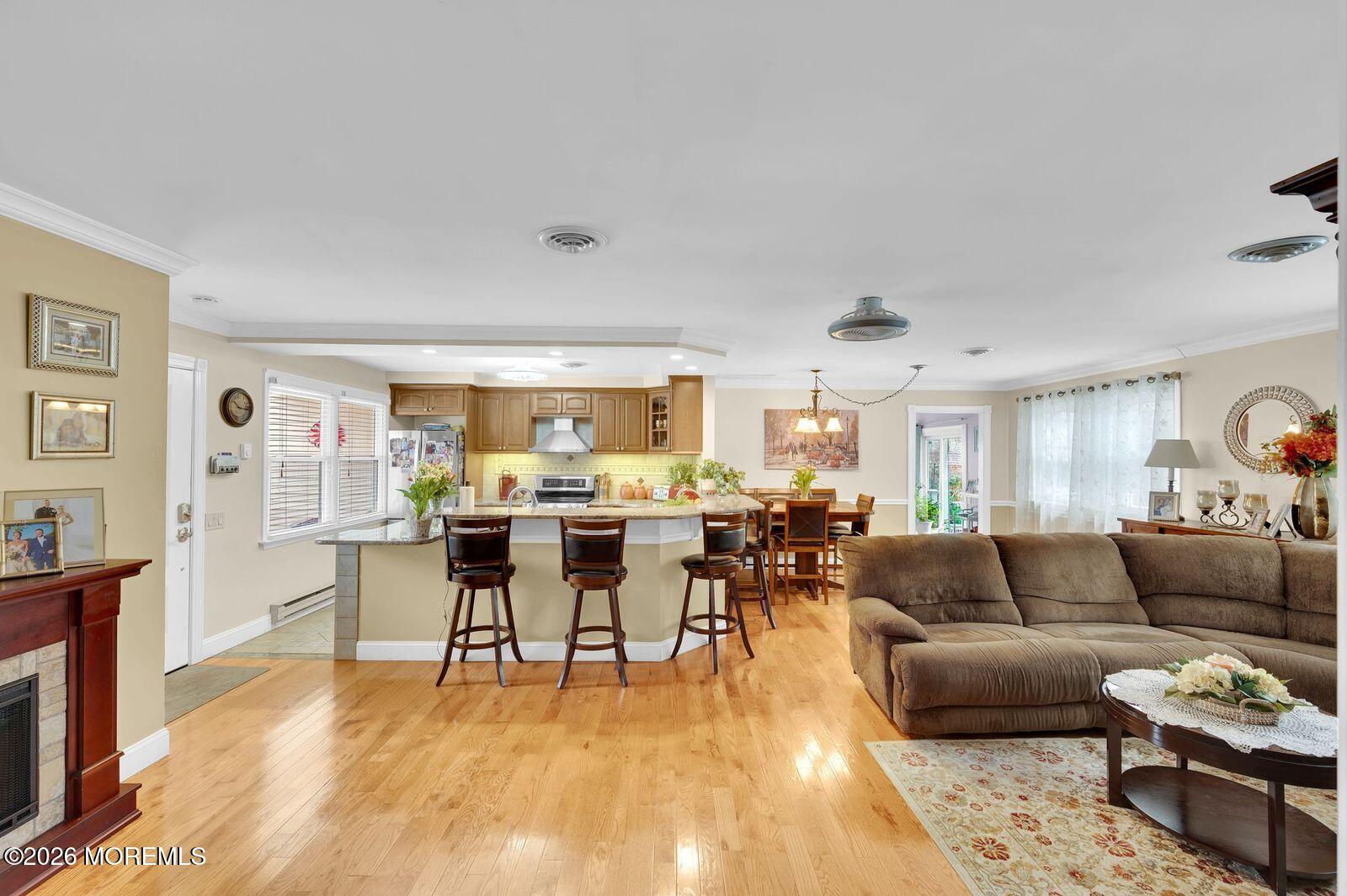 7 Eaton Lane, Unit 73 Whiting, NJ 08759 - Photo 12 of 37 a living room with furniture and view of kitchen