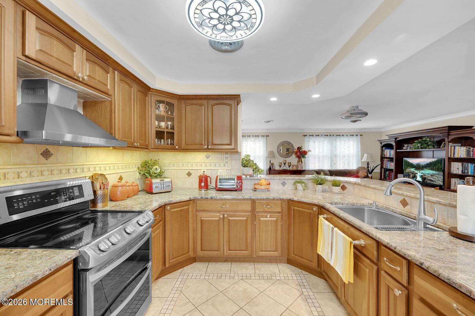 7 Eaton Lane, Unit 73 Whiting, NJ 08759 - Photo 20 of 37 a kitchen with a sink stove and cabinets