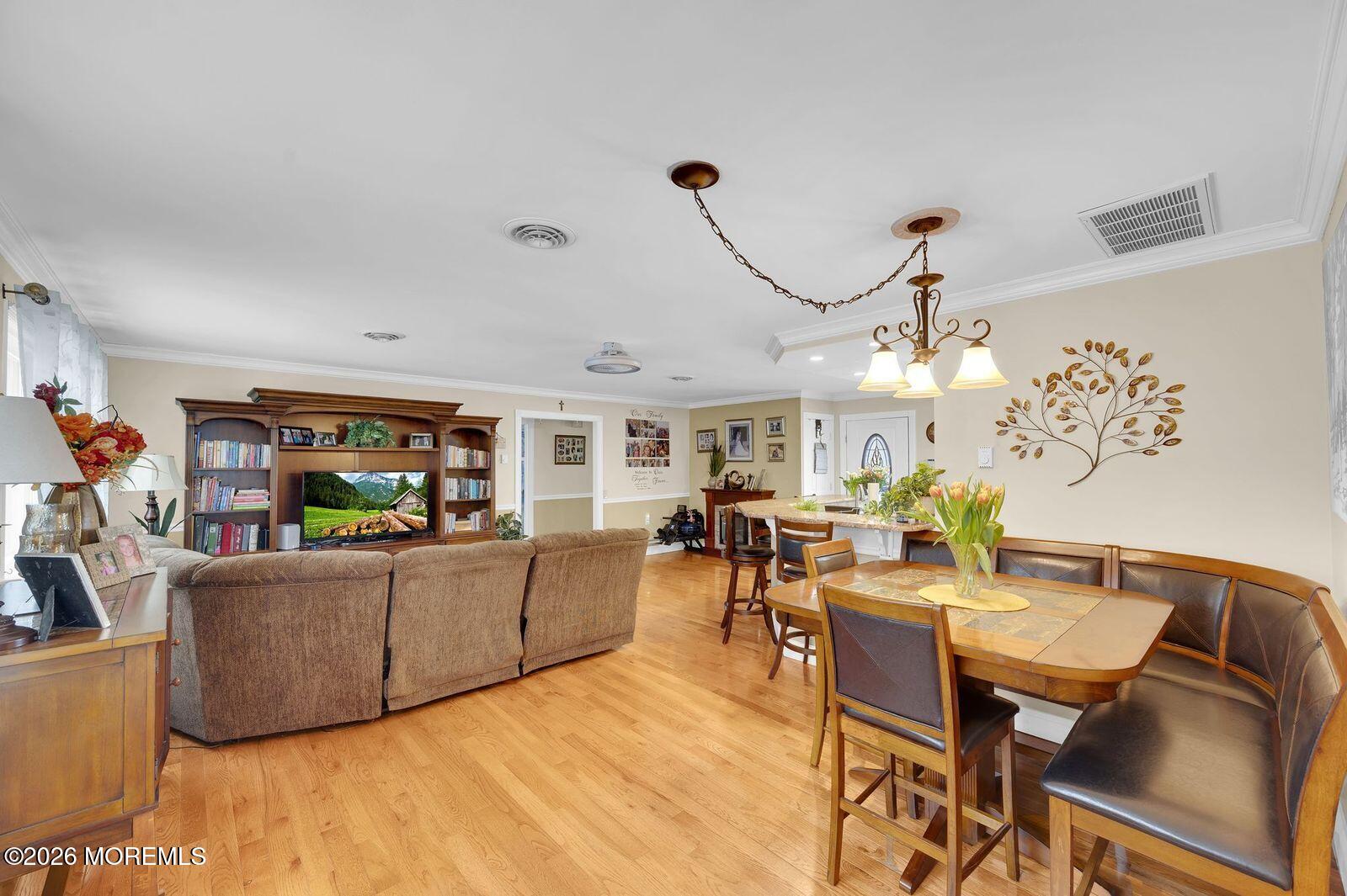7 Eaton Lane, Unit 73 Whiting, NJ 08759 - Photo 25 of 37 a living room with furniture and a flat screen tv
