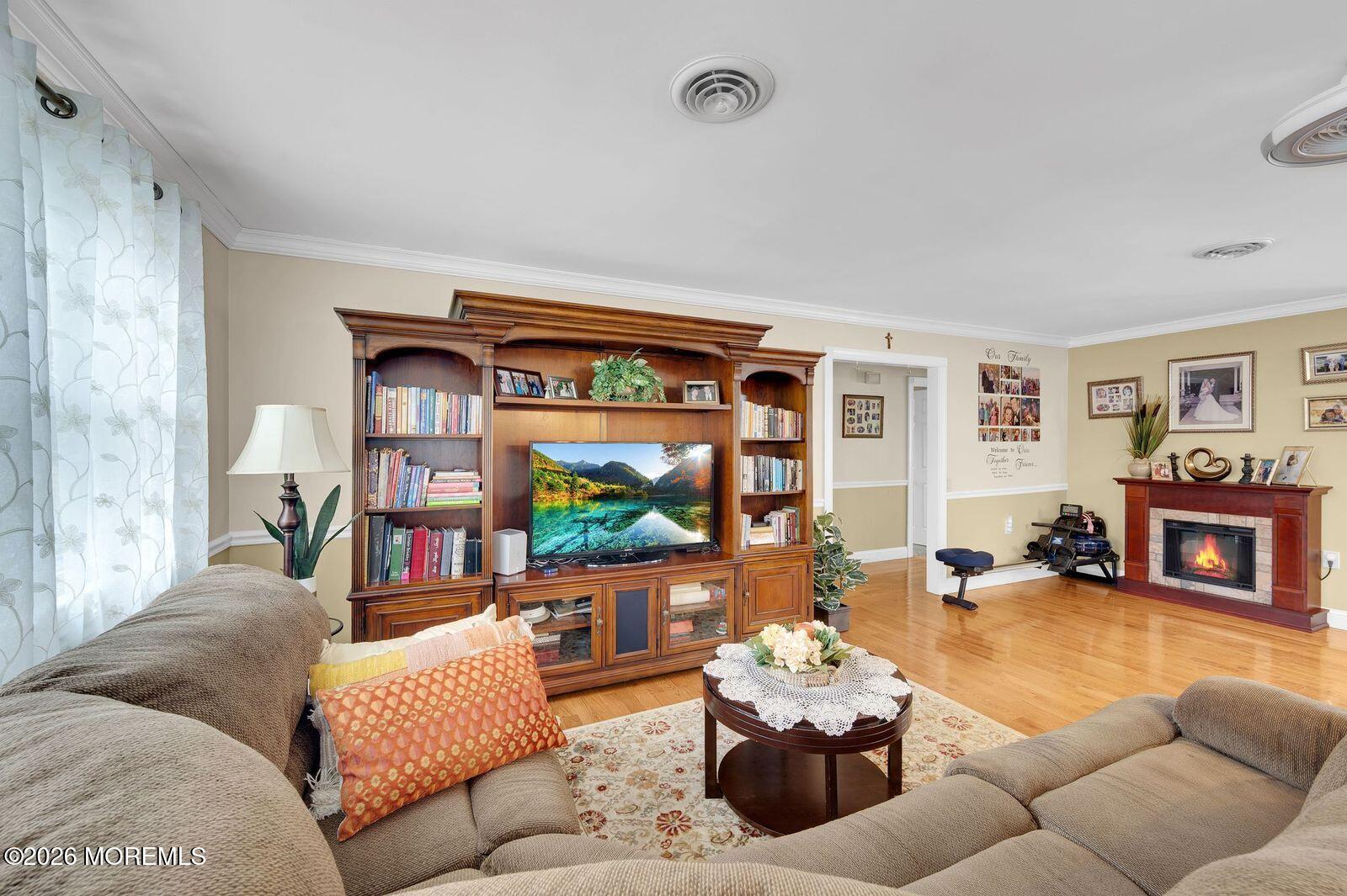 7 Eaton Lane, Unit 73 Whiting, NJ 08759 - Photo 28 of 37 a living room with furniture and a large window