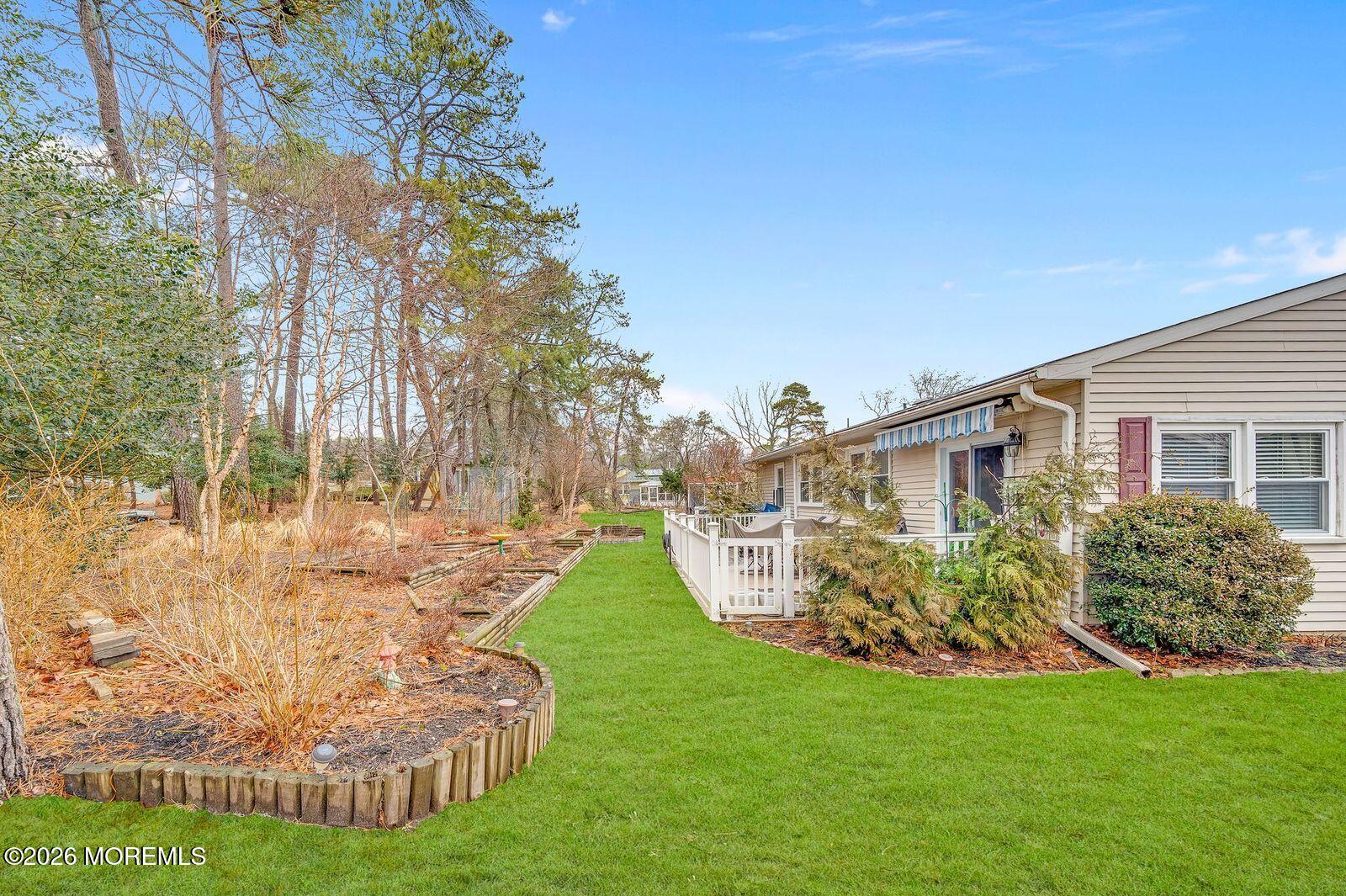 7 Eaton Lane, Unit 73 Whiting, NJ 08759 - Photo 5 of 37 a view of a house with a yard