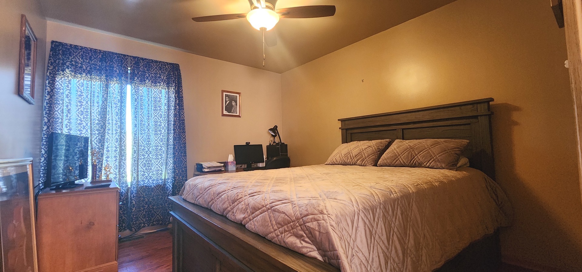 113 Sundance Road Matteson, IL 60443 - Photo 34 of 47 a bedroom with a bed and a chandelier
