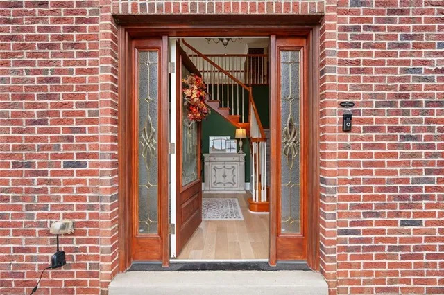 a view of a house with backyard sitting area and garden