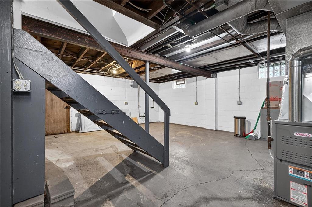 1107 Constitution Street Tarentum, PA 15084 - Photo 23 of 42 a view of an empty room with stairs