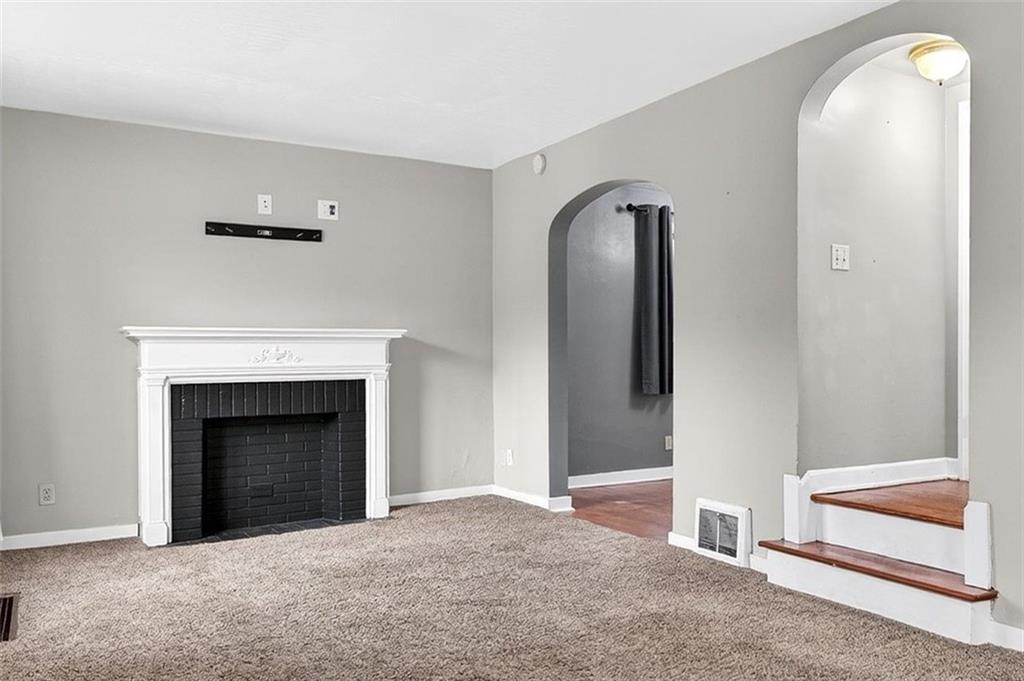 1107 Constitution Street Tarentum, PA 15084 - Photo 8 of 42 a view of livingroom with fireplace
