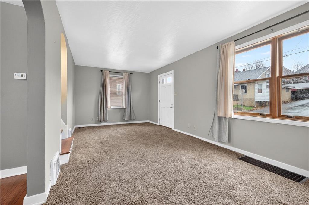 1107 Constitution Street Tarentum, PA 15084 - Photo 9 of 42 a view of an empty room with a window