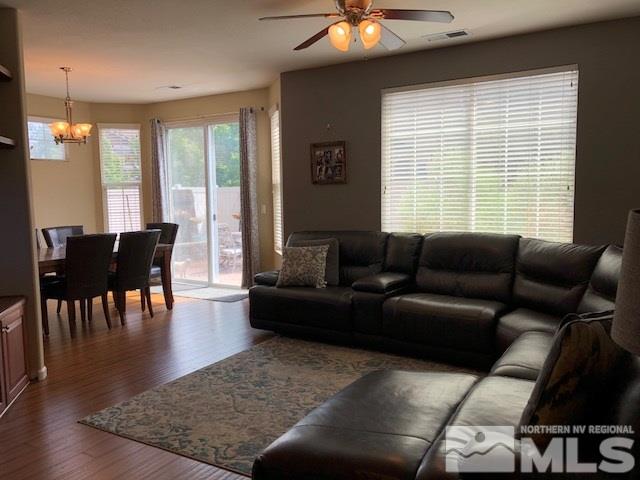 11024 Lamour Lane Reno, NV 89521 - Photo 2 of 20 a living room with furniture and a large window
