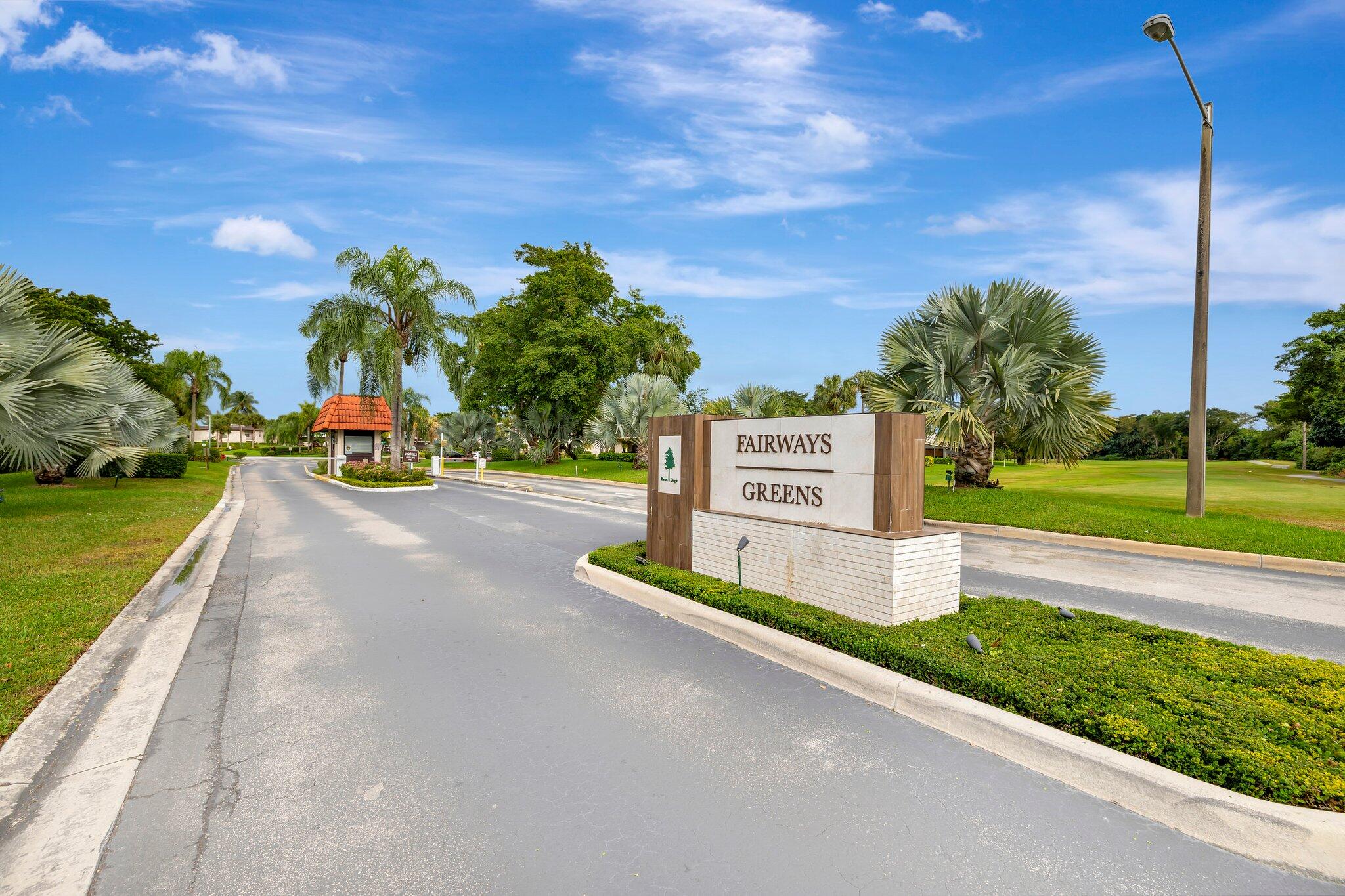 8536 Casa Del Lago, Unit 49B Boca Raton, FL 33433 - Photo 65 of 79 a view of a street with a building in the background