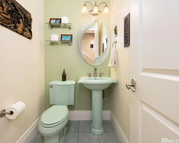 a utility room with sink dryer and washer