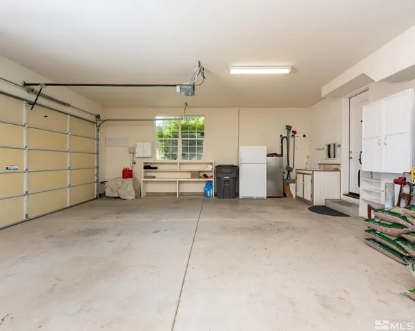 a lobby with furniture and garden