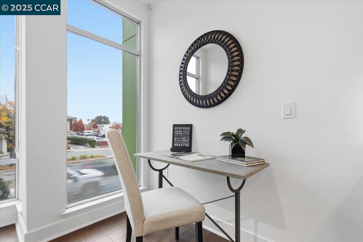 555 Ygnacio Valley Road, Unit 204 Walnut Creek, CA 94596 - Photo 11 of 38 a room with a table and a mirror