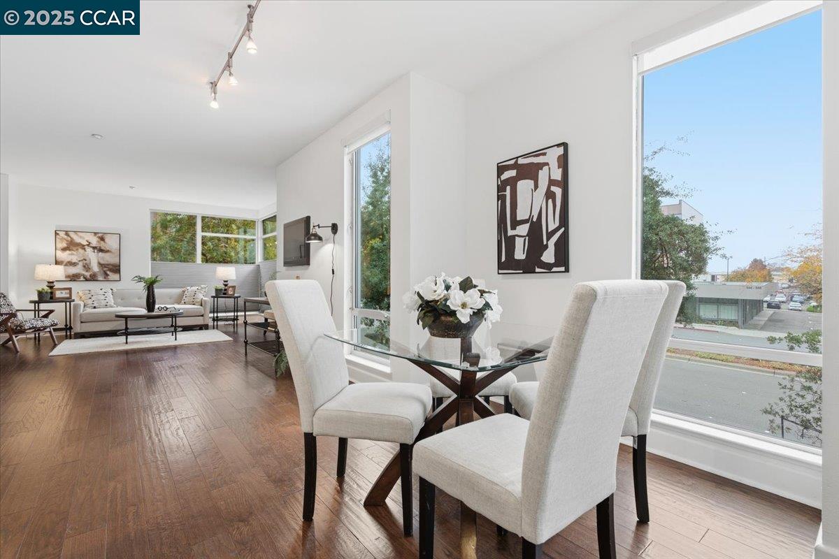555 Ygnacio Valley Road, Unit 204 Walnut Creek, CA 94596 - Photo 12 of 38 a view of a dining room with furniture and wooden floor