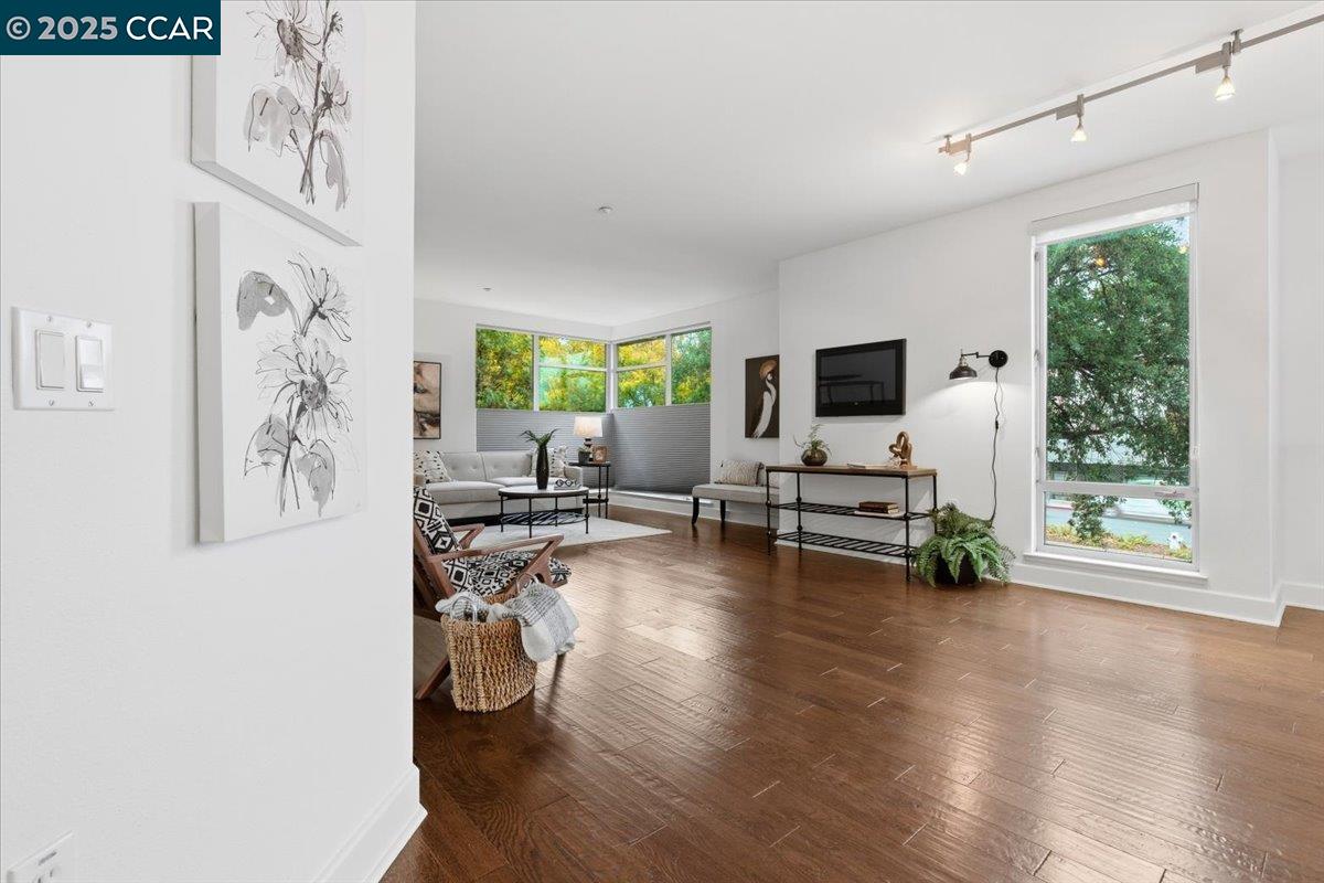 555 Ygnacio Valley Road, Unit 204 Walnut Creek, CA 94596 - Photo 14 of 38 a view of a livingroom with workspace and a window