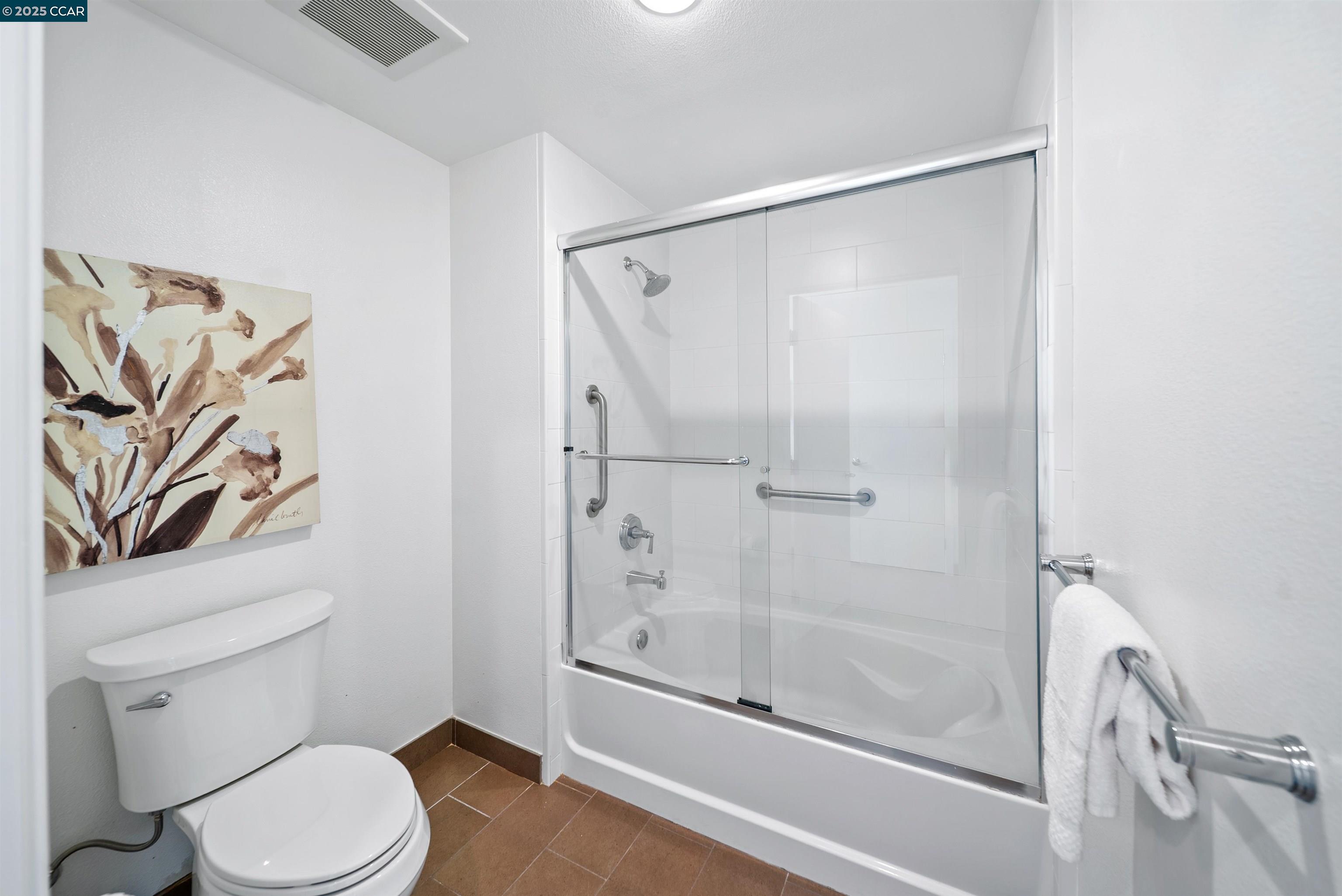 555 Ygnacio Valley Road, Unit 204 Walnut Creek, CA 94596 - Photo 24 of 38 a white toilet sitting next to a bath tub