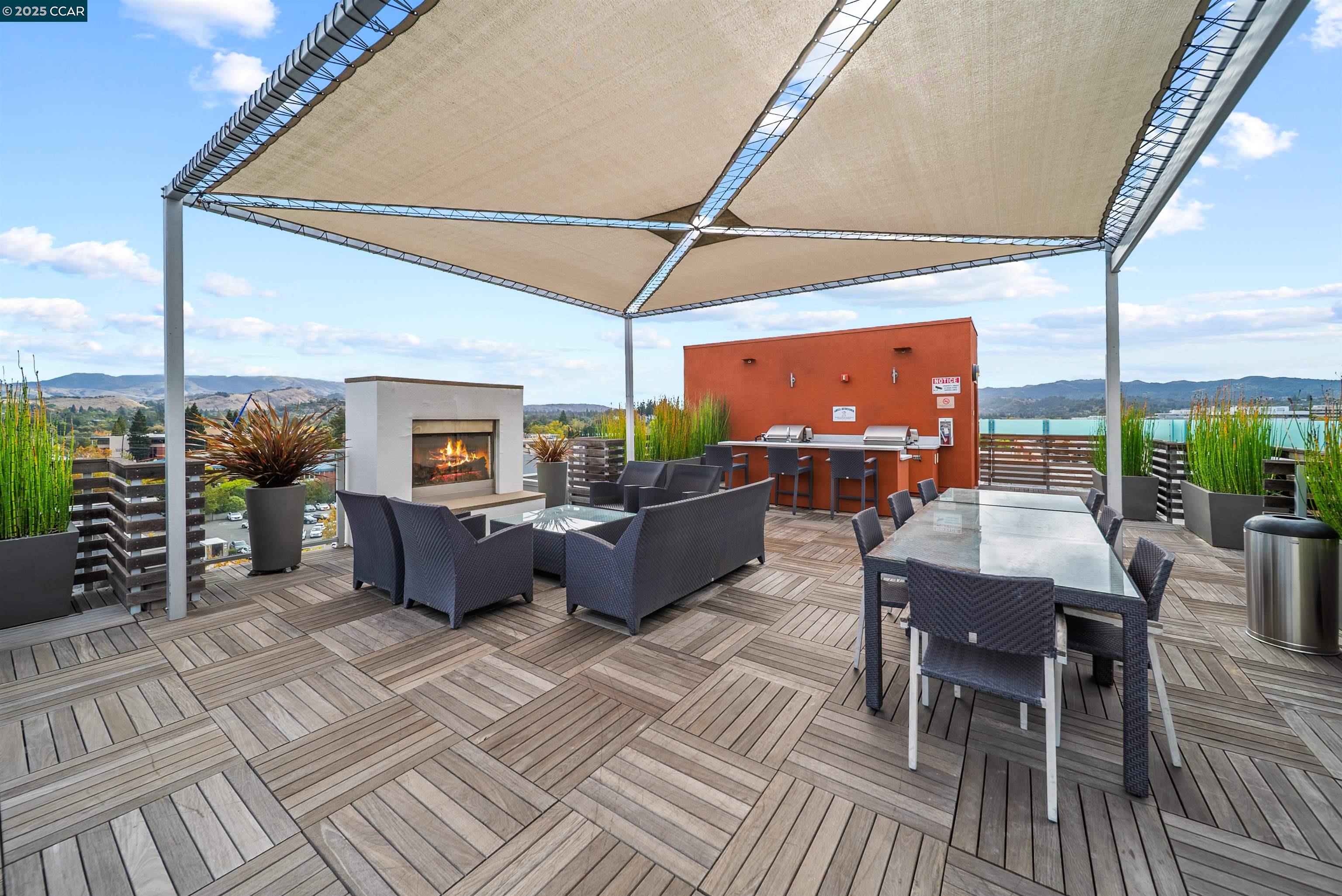 555 Ygnacio Valley Road, Unit 204 Walnut Creek, CA 94596 - Photo 27 of 38 a view of a patio with table and chairs