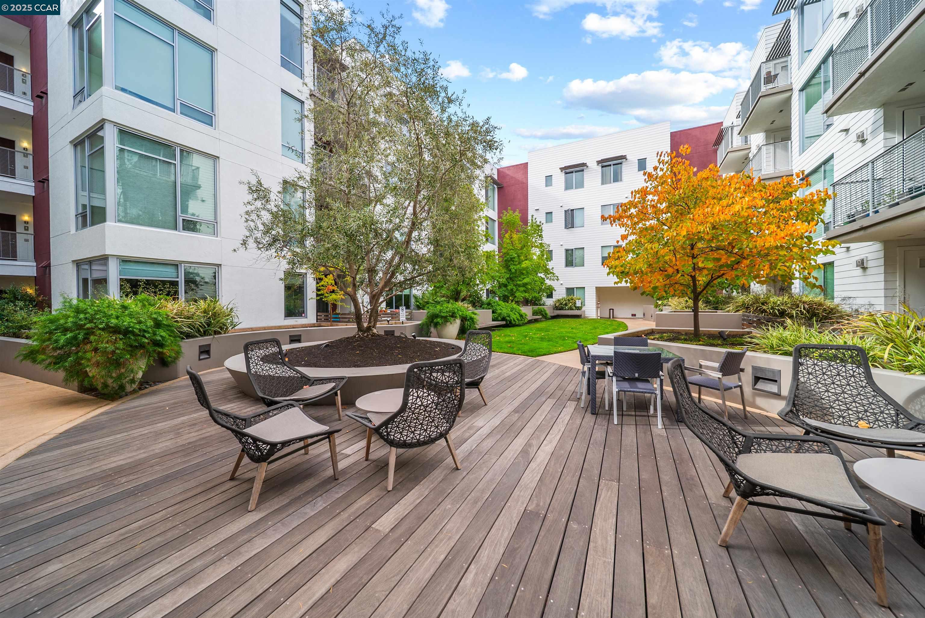 555 Ygnacio Valley Road, Unit 204 Walnut Creek, CA 94596 - Photo 29 of 38 a view of a patio with table and chairs and potted plants