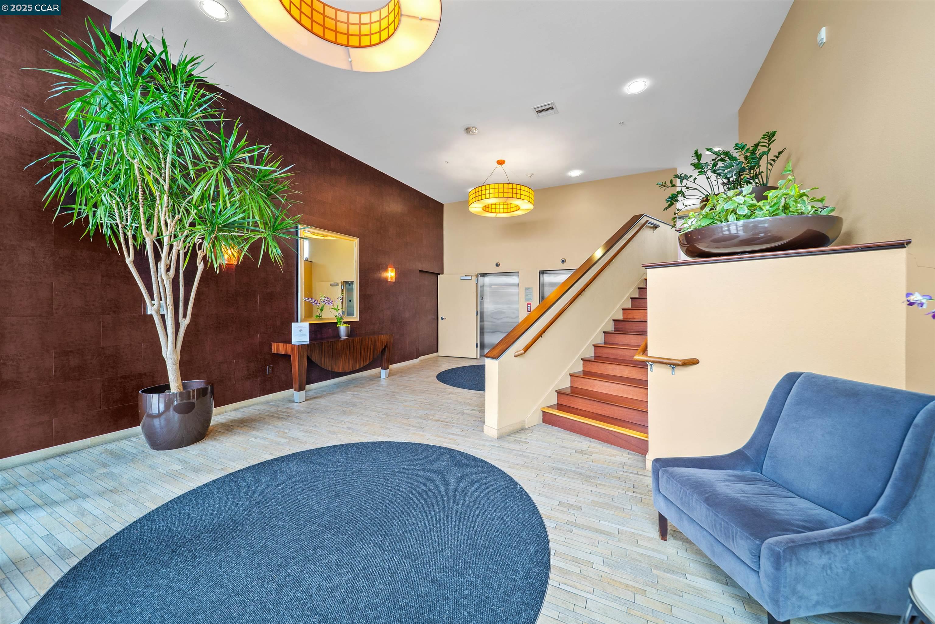 555 Ygnacio Valley Road, Unit 204 Walnut Creek, CA 94596 - Photo 30 of 38 a view of entryway and hall with wooden floor