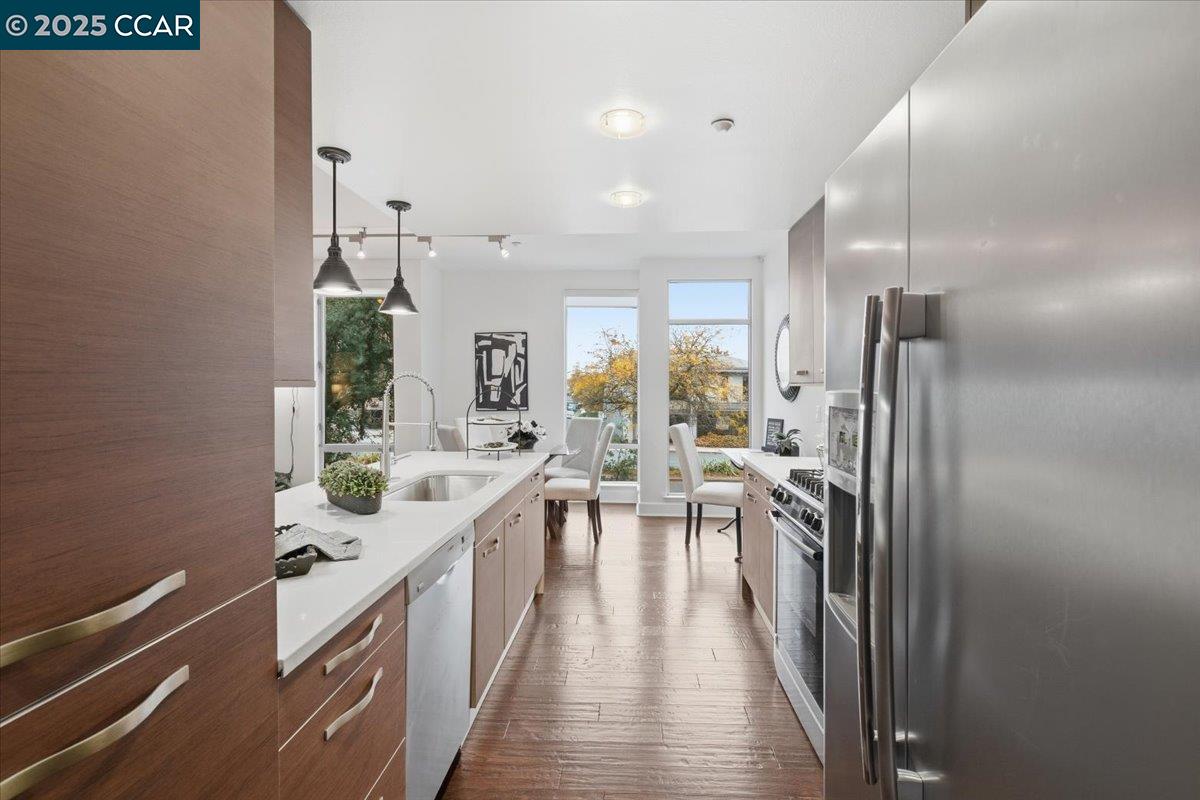 555 Ygnacio Valley Road, Unit 204 Walnut Creek, CA 94596 - Photo 8 of 38 a large white kitchen with a large window