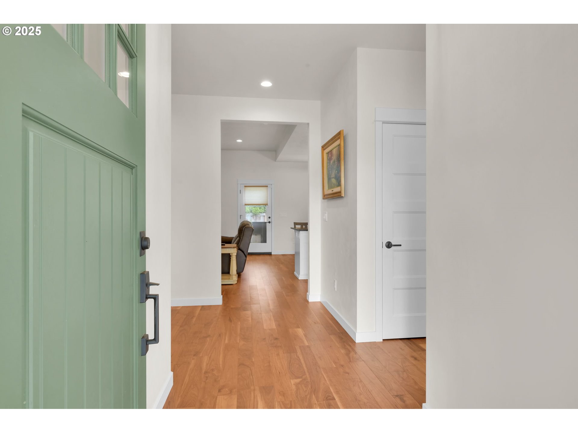 970 Lupine Street Springfield, OR 97477 - Photo 15 of 47 a view of a hallway with wooden floor