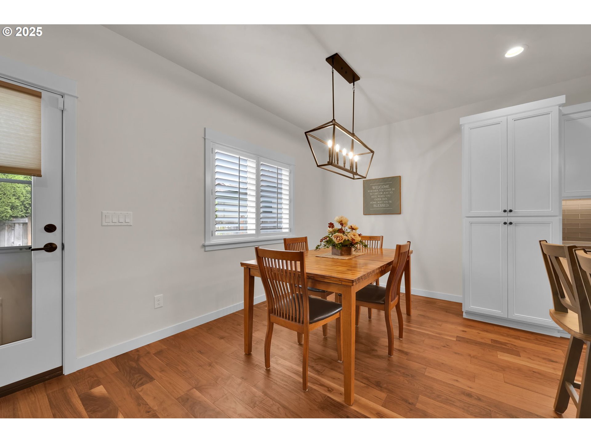 970 Lupine Street Springfield, OR 97477 - Photo 23 of 47 a view of a dining room with furniture window and wooden floor