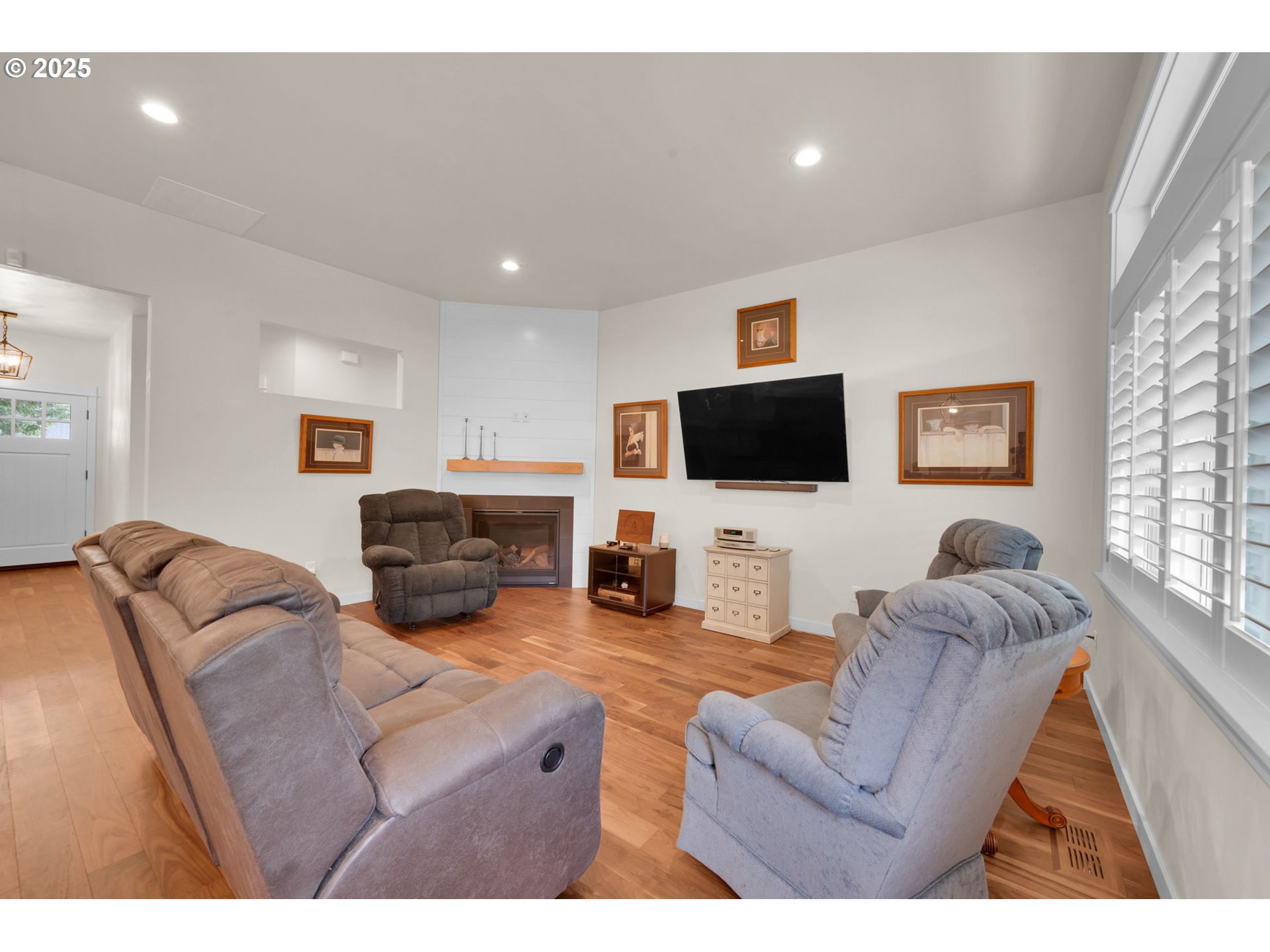 970 Lupine Street Springfield, OR 97477 - Photo 24 of 47 a living room with furniture and a flat screen tv