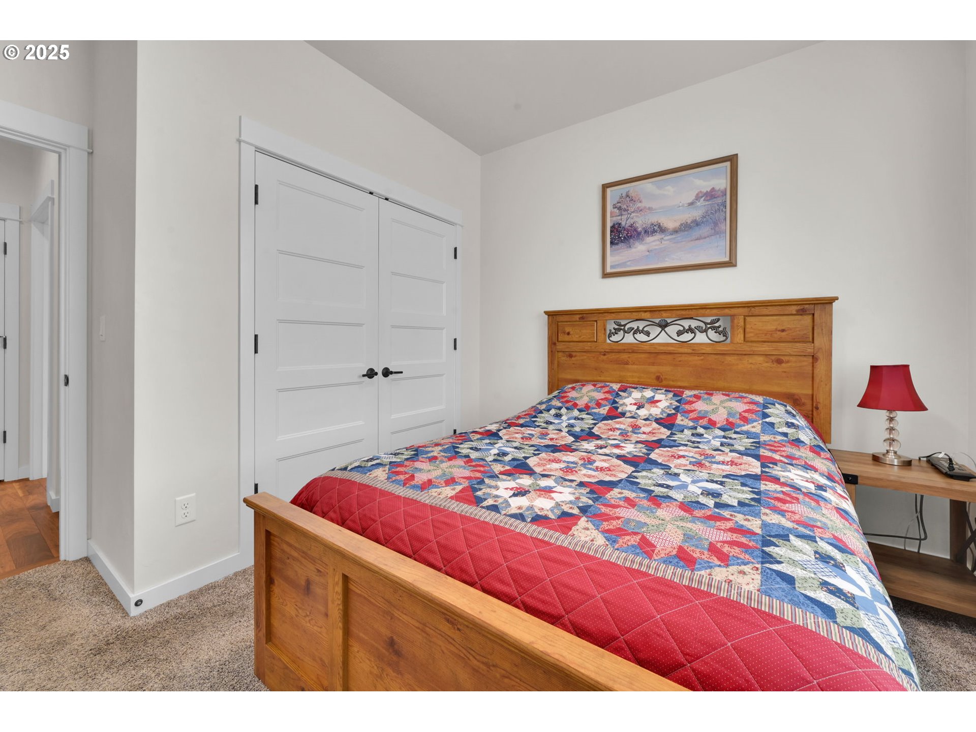 970 Lupine Street Springfield, OR 97477 - Photo 29 of 47 a bedroom with a bed and a painting on the wall