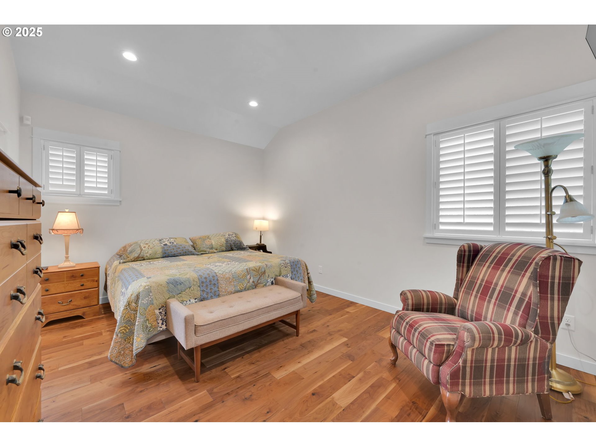 970 Lupine Street Springfield, OR 97477 - Photo 37 of 47 a bedroom with a bed and a couch