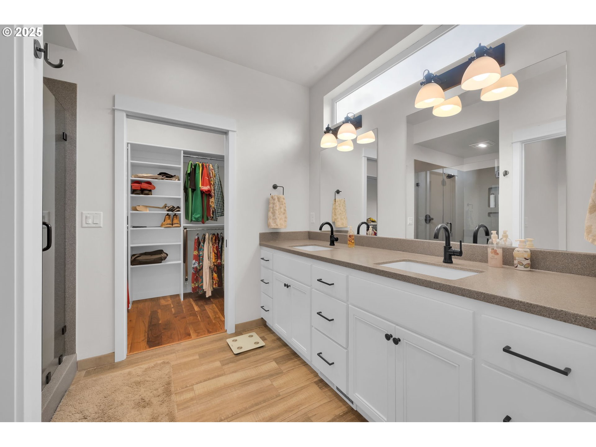 970 Lupine Street Springfield, OR 97477 - Photo 40 of 47 a bathroom with a granite countertop sink mirror and a light fixture