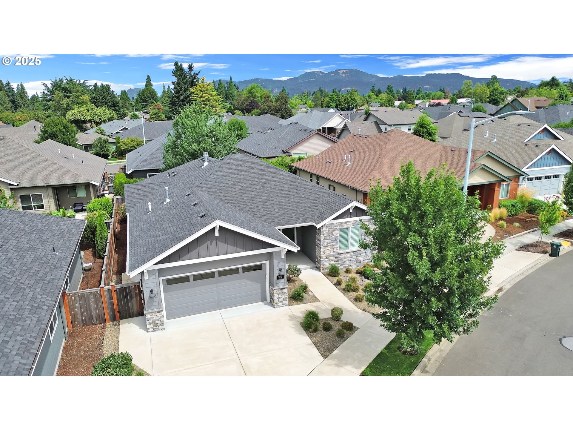 970 Lupine Street Springfield, OR 97477 - Photo 8 of 47 an aerial view of residential houses with outdoor space