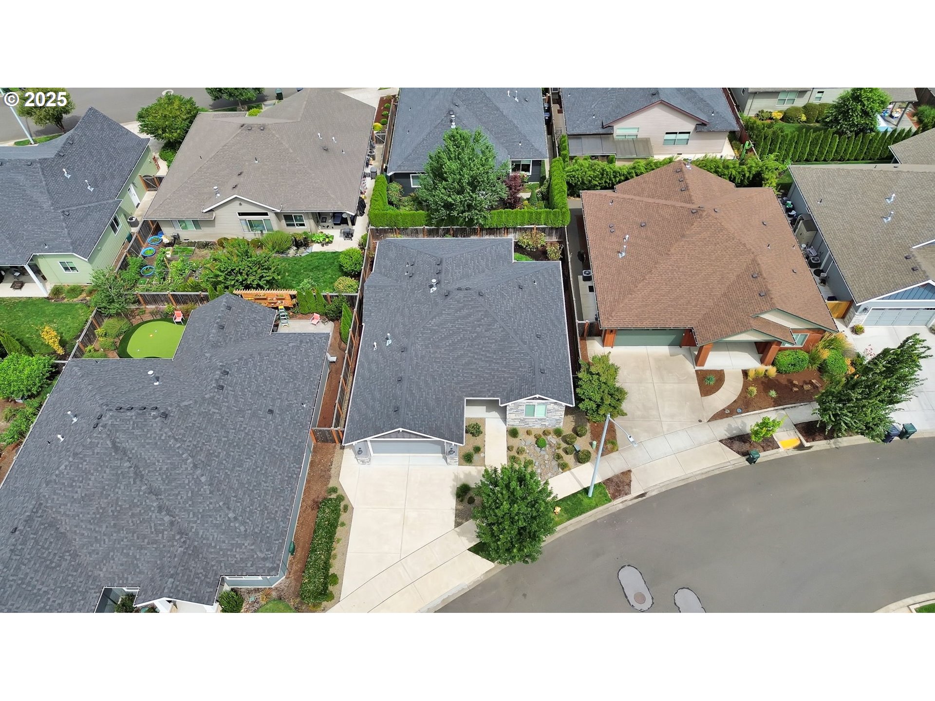 970 Lupine Street Springfield, OR 97477 - Photo 9 of 47 an aerial view of a house with a yard and a sitting area