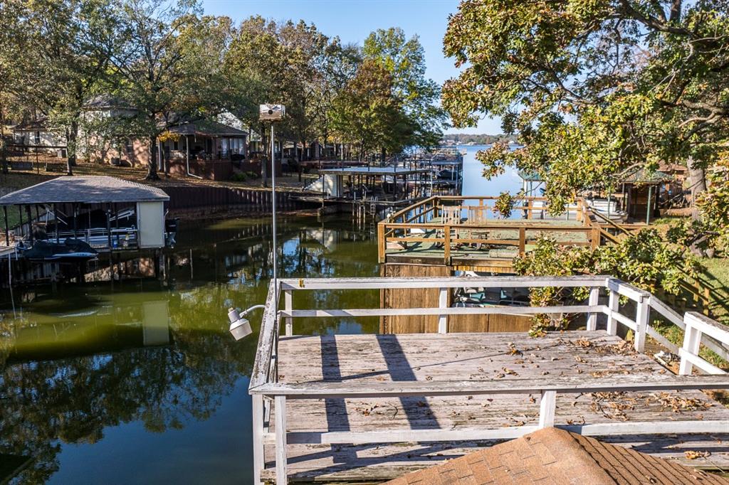 5540 Point Lavista Malakoff, TX 75148 - Photo 11 of 16 a view of a lake with a house