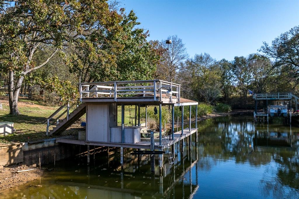 5540 Point Lavista Malakoff, TX 75148 - Photo 13 of 16 a view of house with swimming pool and outdoor seating