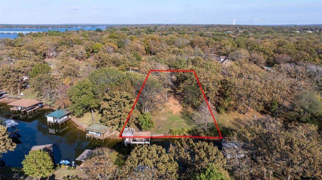 5540 Point Lavista Malakoff, TX 75148 - Photo 2 of 16 an aerial view of a houses with a yard