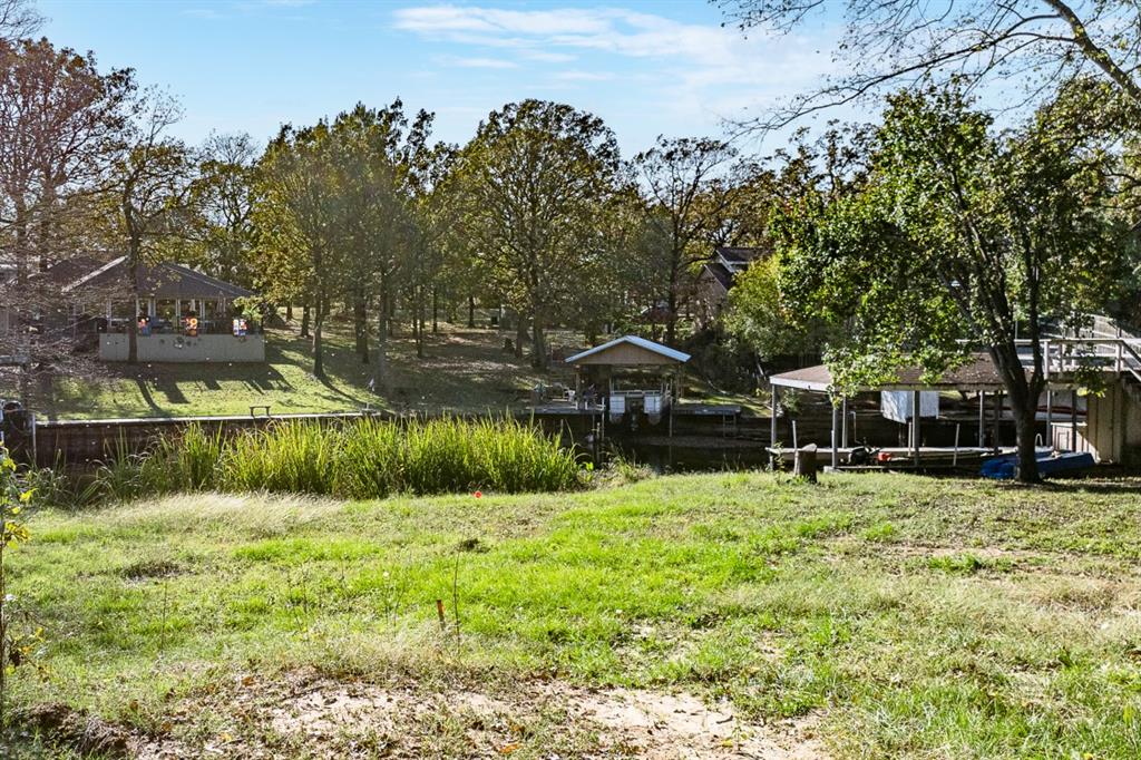 5540 Point Lavista Malakoff, TX 75148 - Photo 9 of 16 a backyard of a house with lots of green space