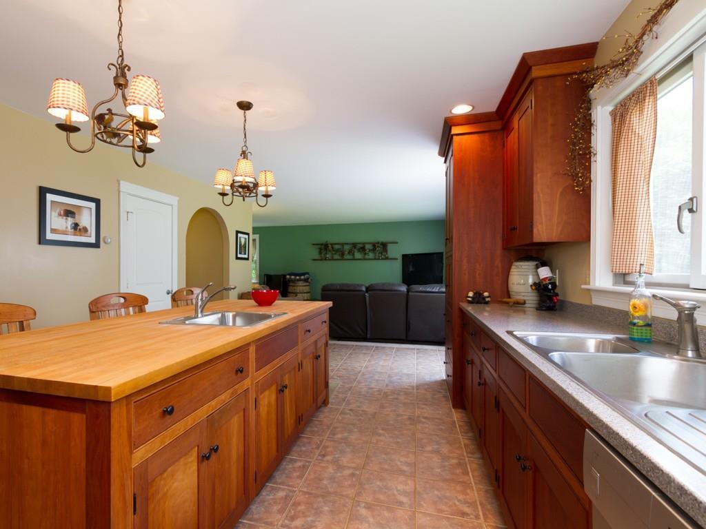 474 Hancock Pond Road Sebago, ME 04029 - Photo 5 of 33 The kitchen is open to the living...
