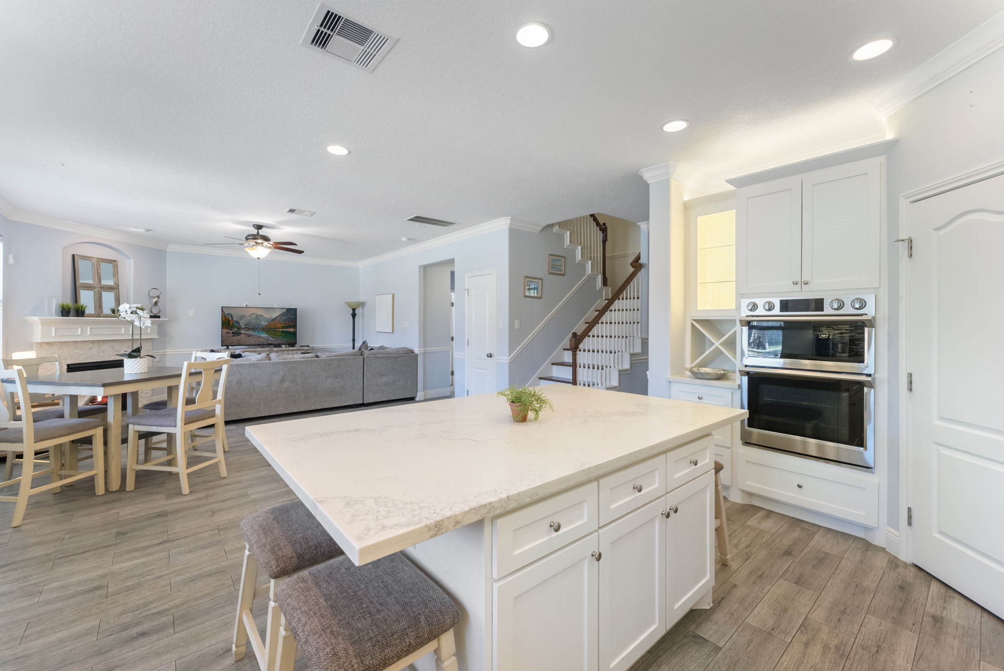 119 Wood Drake Place Tomball, TX 77375 - Photo 12 of 47 a view of kitchen with cabinets and wooden floor